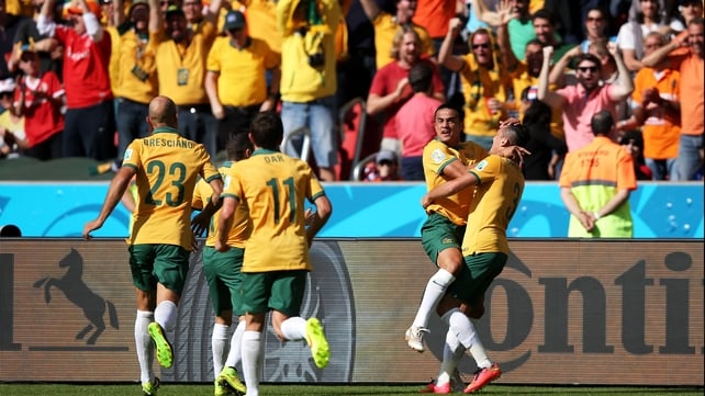 Cahill celebrates with his team-mates and fans. The goal was his second of the World Cup so far