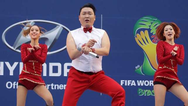 South Korean singer Psy performs during a public screening for the 2014 World Cup match between South Korea and Russia