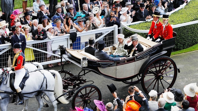 The UK's Queen Elizabeth II, Prince Philip, Duke of Edinburgh, The Emir of Qatar and The Lord Vestey during the Royal Procession on day two of Royal Ascot