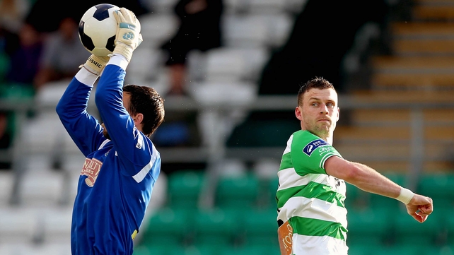 Shamrock Rovers' Ciaran Kilduff also none too pleased, this time with goalkeeper Mark McNulty of Cork City
