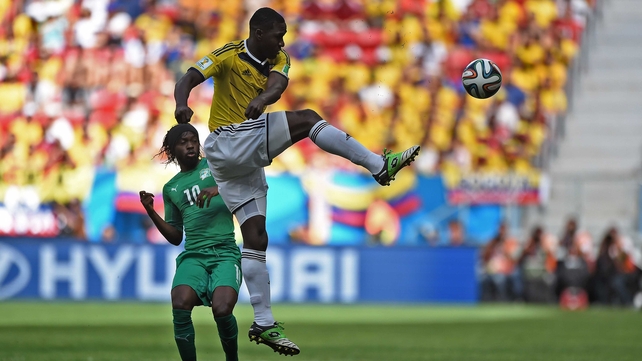 And then, on the other end, Ivory Coast forward Gervinho watched as Colombia defender Cristian Zapata moved the ball back down the pitch