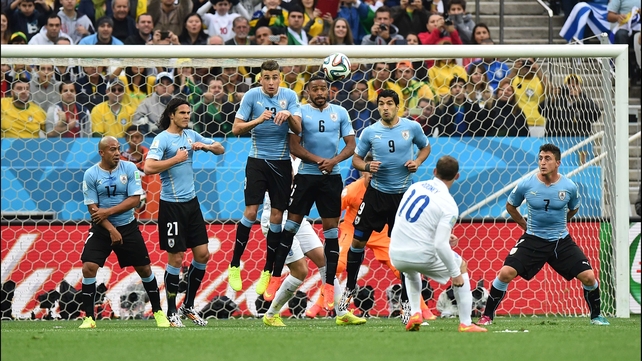 And England star striker Wayne Rooney - who came into the match under a tremendous amount of pressure to live up to his billing - had multiple chances to make his mark in the first half. Here, he just missed wide left on a free kick