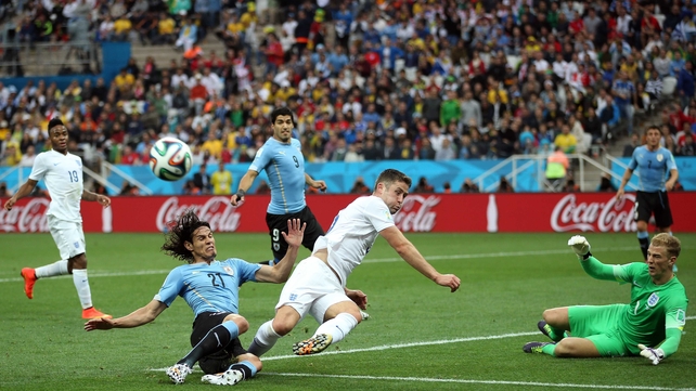 Uruguay came back out continuing their relentless attack on goal, as Cahill cleared away this ball from Uruguay forward Edinson Cavani