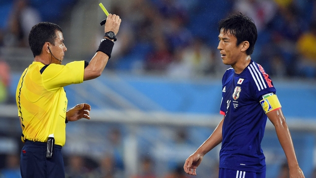 Japan midfielder Makoto Hasebe broke up the monotony at 12' when he received a yellow card for a sloppy tackle