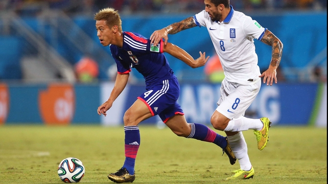 Japan star striker Keisuke Honda failed to make anything of some fleeting chances in the first half, as Greece midfielder Panagiotis Kone and the like kept him in check