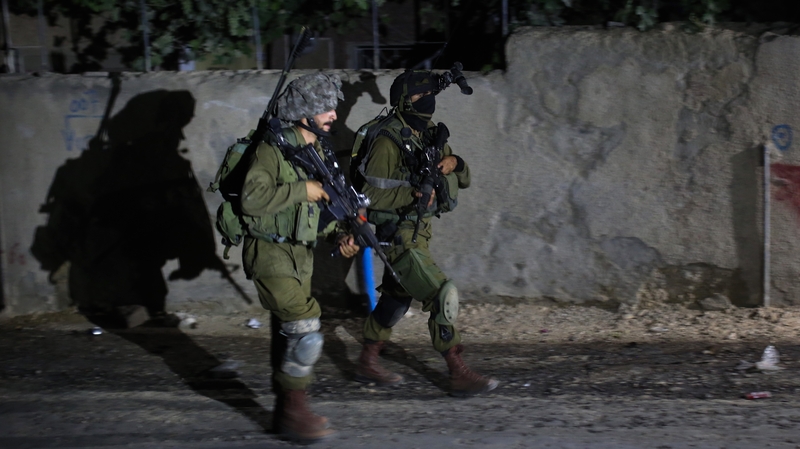 Israeli soldiers during a night raid on the West Bank village of Arura