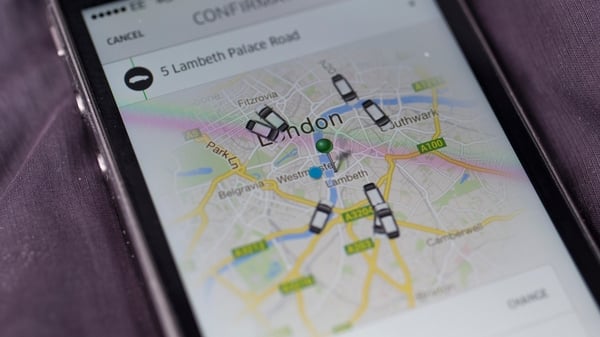 Uber clams it is just an intermediary between drivers and customers but critics say it provides a transportation service