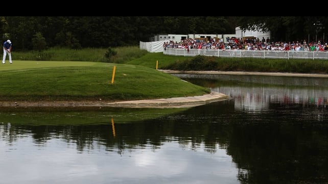 Padraig Harrington putts on the third green during day two