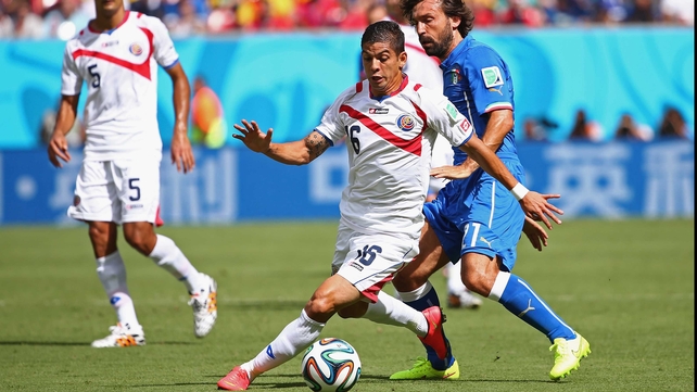 Costa Rica established a solid presence to start, going toe to toe with Italy for possession. Here, Costa Rica defender Oscar Duarte kept the ball safe from Italy veteran midfielder Andrea Pirlo