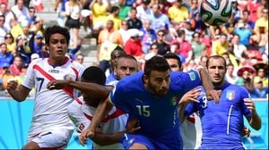 Italy defender Andrea Barzagli cleared the ball away with a strong header
