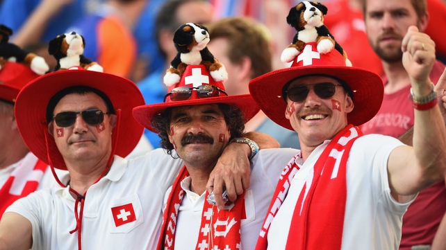 ... while the Swiss - and their little mountain dogs - looked equally jolly