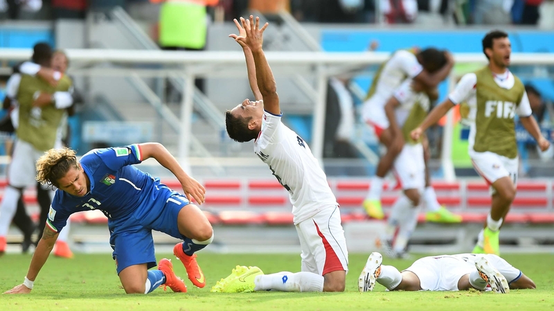 Michael Umana of Costa Rica celebrates at the final whistle