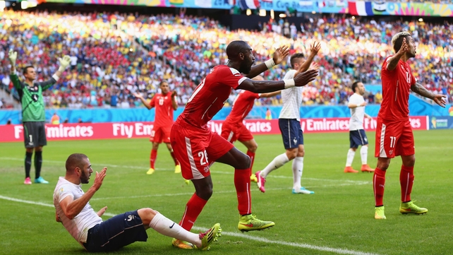 The Swiss had clearly become rattled by the hole they had dug for themselves, as defender Johan Djourou protested a needless penalty on Benzema