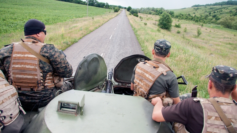 Ukrainian troops patrol an area near the border of Ukraine with Russia outside Kharkiv