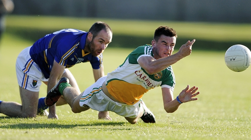 Offaly’s Eoin Carroll with Patrick McWalter of Wicklow in Aughrim