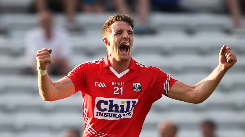Cork's Aidan Walsh celebrates scoring a point during the final moments of the match