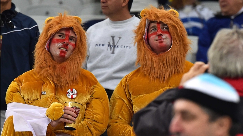 Dejected England fans after their side's defeat to Uruguay