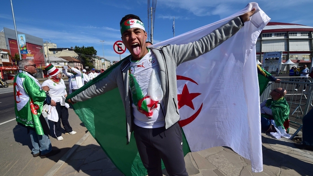 The Algeria fans were not fazed by the mysterious South Korean mascots afoot