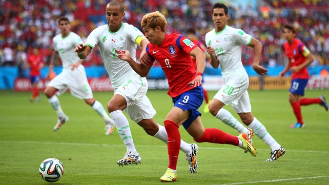 South Korea midfielder Son Heung-Min helped the match get off to a fast start working against Algeria defender Madjid Bougherra