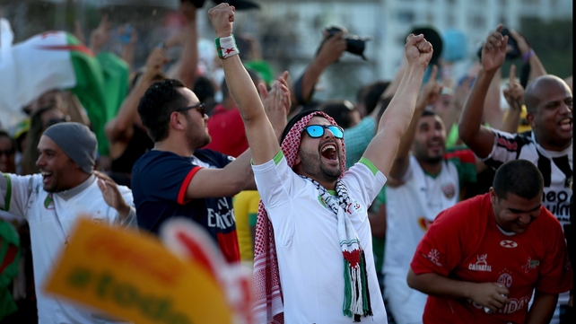 Algeria fans celebrated what looked to be a total rout heading into the half-time break