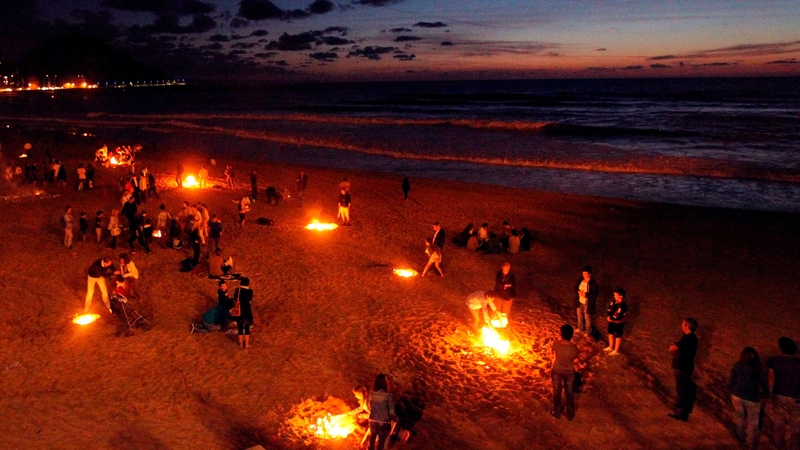People celebrating St John's Eve at Zurriola beach in San Sebastian, Spain, in 2011