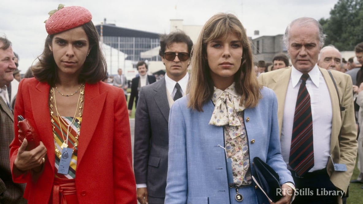 Who is the lady in red with Princess Caroline?