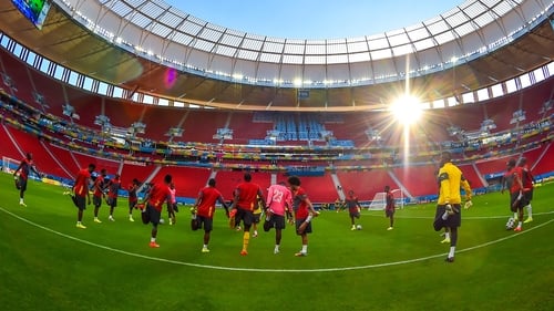 Cameroon's players warm up during a training session at Mane Garrincha Stadium