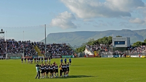Galway and Sligo stand to attention for the national anthem before their Connacht semi-final clash in Markievicz Park