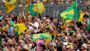 Donegal fans cheers on their team against Antrim in Clones