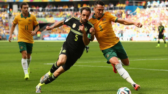 Play started out evenly, with both sides working to settle into the game from the start. Here, Spain defender Juanfran vied for the ball with Australia defender Jason Davidson