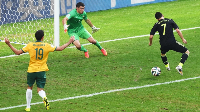 And at 36' veteran Spain forward David Villa scored the first goal of Day 12, on a clever no-look flick that snuck past Australia keeper Maty Ryan