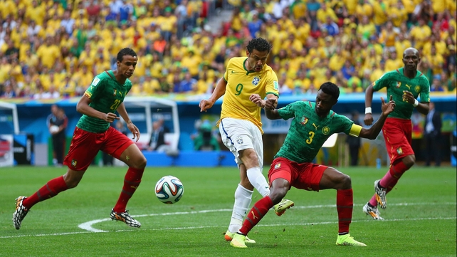 Early on, Brazil were able to penetrate. Cameroon defender Nicolas N'Koulou made a challenge on Brazil forward Fred that set up a dangerous free kick...
