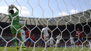England's Ben Foster makes a fine save against Costa Rica...