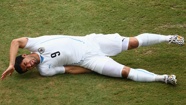 Luis Suarez in agony - he was okay afterwards, surprisingly