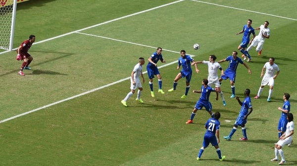 Godin strikes late to send Uruguay through
