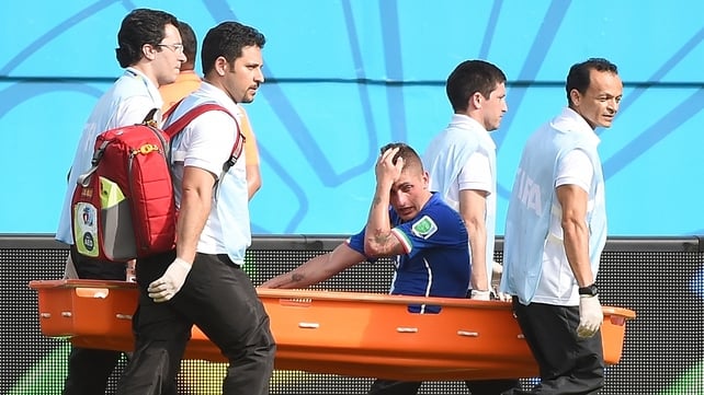 Italy's Marco Verratti is stretchered off against Uruguay