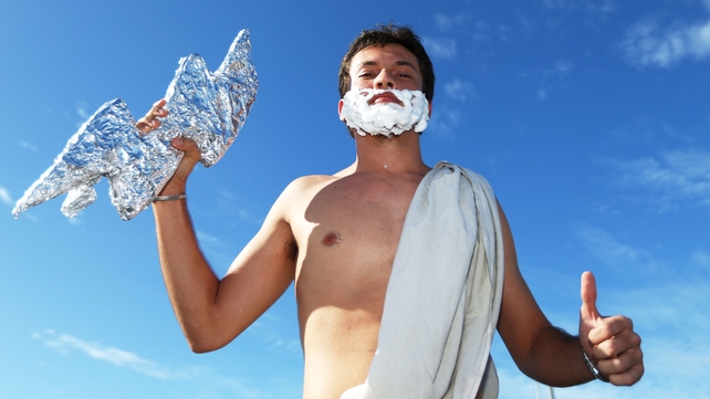 Ye gods: A confused but happy Greece fan enjoys the atmosphere prior to Greece vs Ivory Coast