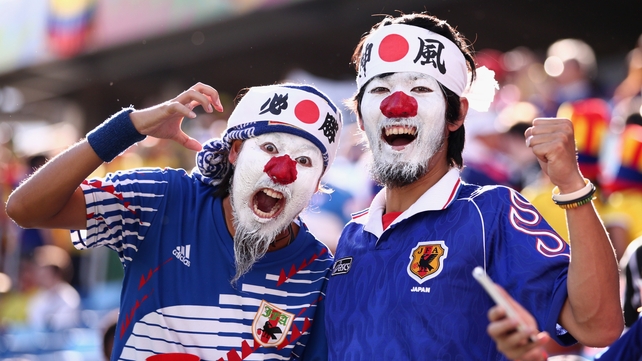 Japanese fans show their colours ahead of their side's game against Colombia