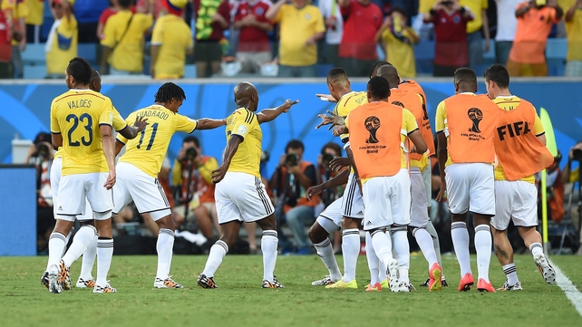 ... and Cuadrada celebrates with his team-mates