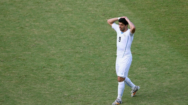 Luis Suarez walking alone