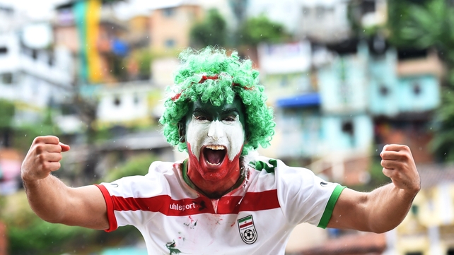The Iranian hulk: A fan shows his colours ahead of Iran's last group game