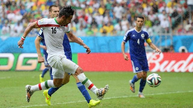 Reza Ghoochannejhad shoots and scores Iran's goal