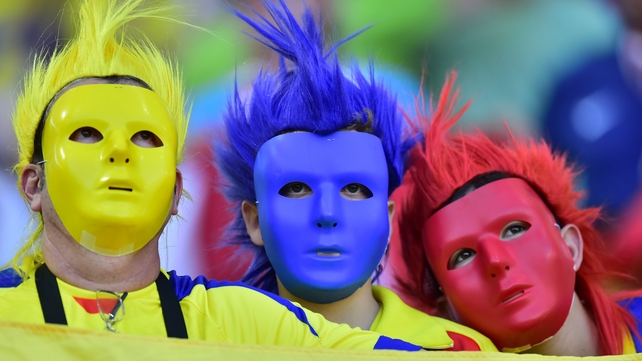 E for Ecuador: These fans are presumably feeling more excited than their faces would suggest