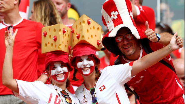 Obligatory shot of Swiss fans with Swiss cheese hats: check