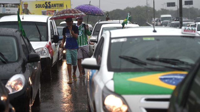 One of the first two matches on the day brought the USA and Germany to rain-soaked Recife, which had experienced heavy flooding in the days leading up to the clash
