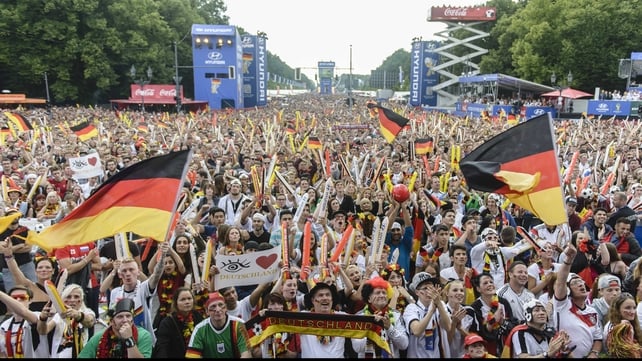 To start the second half, fans watching on in Berlin cheered for their side across the sea...