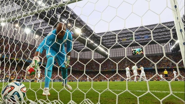 Algeria keeper Rais M'Bolhi dejectedly retrieved the ball from the back of the net