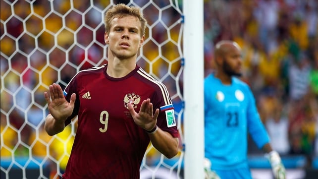 While Kokorin - known at home as 'The Russian Justin Bieber' - dashed away to celebrated and attempted to quiet the crowd with a single signature 'smoulder'