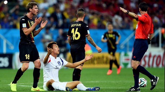 The biggest moment of the first half came right at its conclusion, when midfielder Steven Defour was given a straight red card for stepping on the shin of Shin-wook