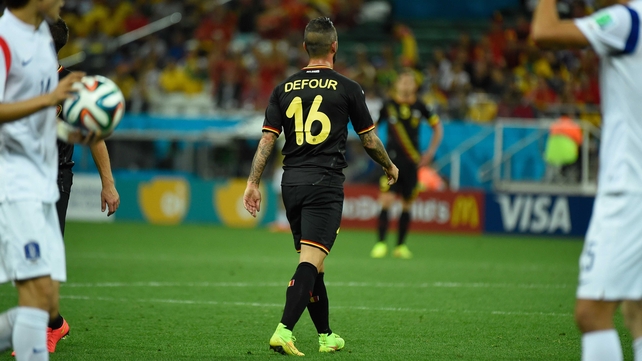 Defour walked off the pitch in silence after the incident